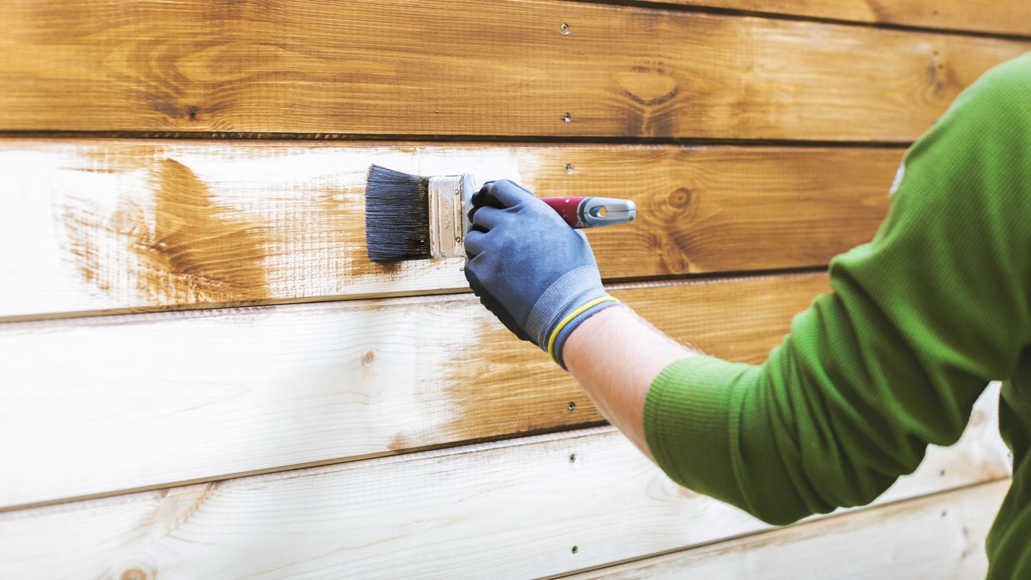 https://s3media.angieslist.com/s3fs-public/man-protective-paint-wood-siding.jpeg?impolicy=leadImage