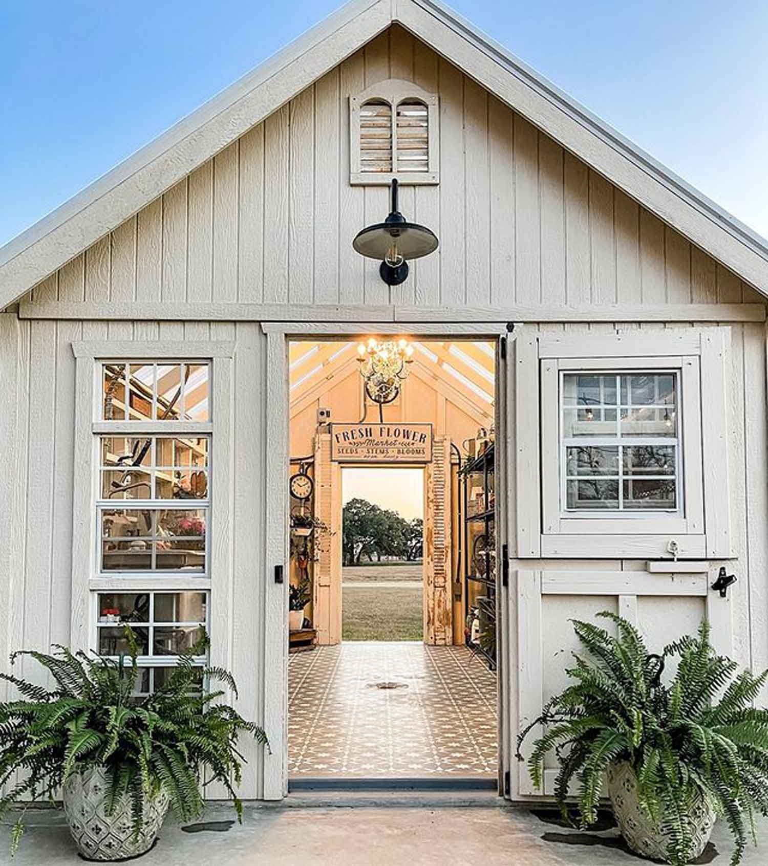 Modern farmhouse style greenhouse exterior