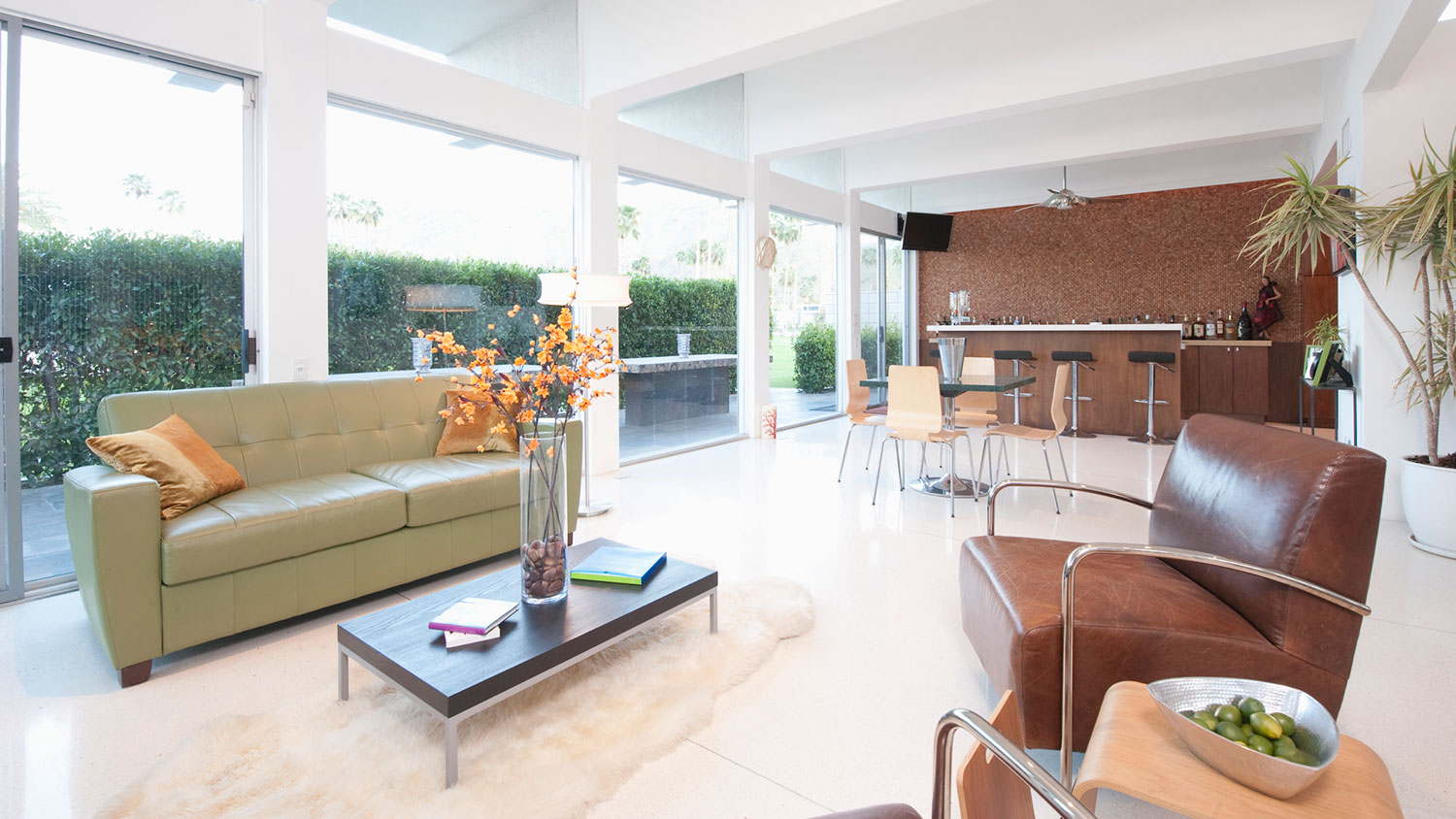 Modern open plan living room with a bar
