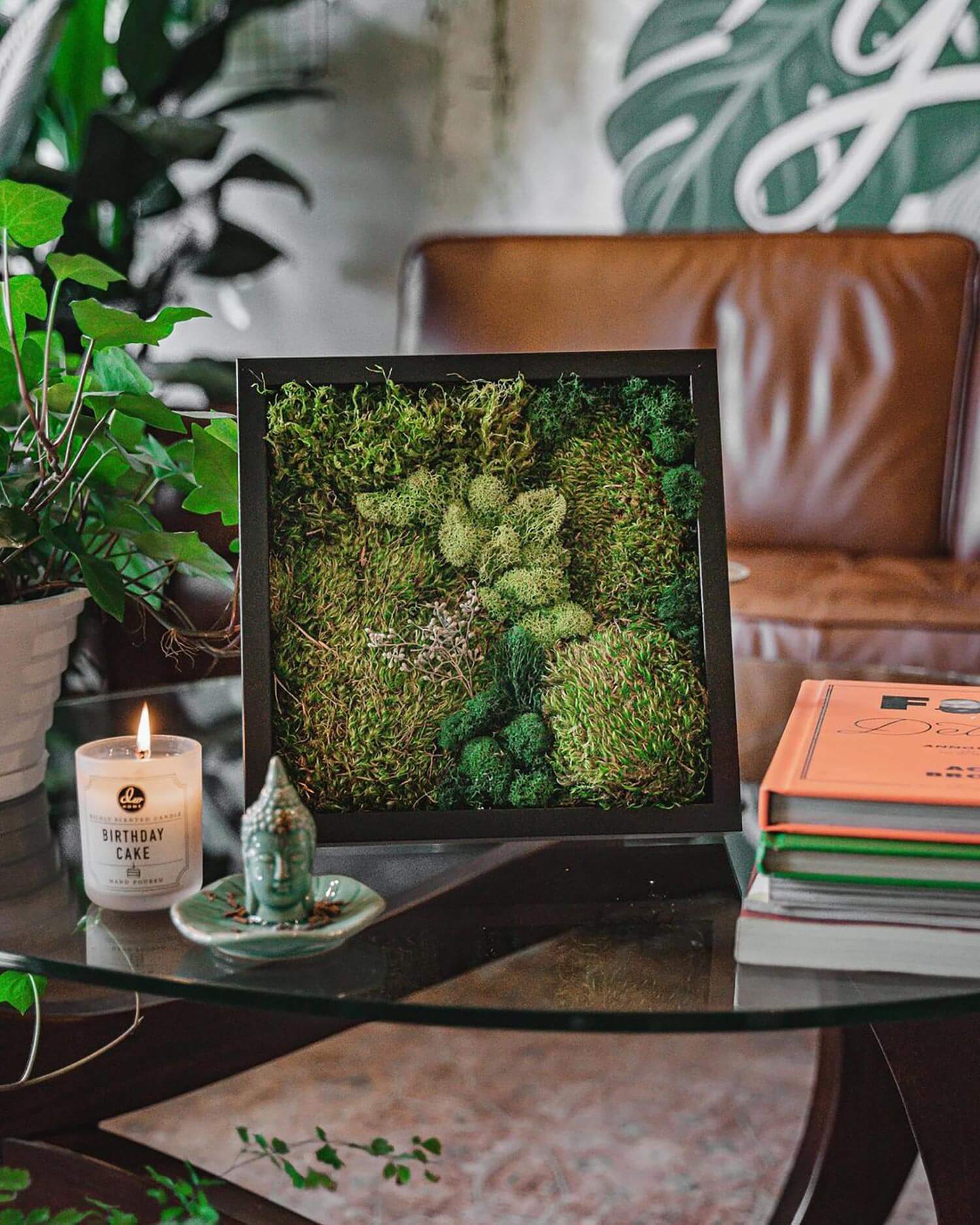 Moss art used as decor on a coffee table