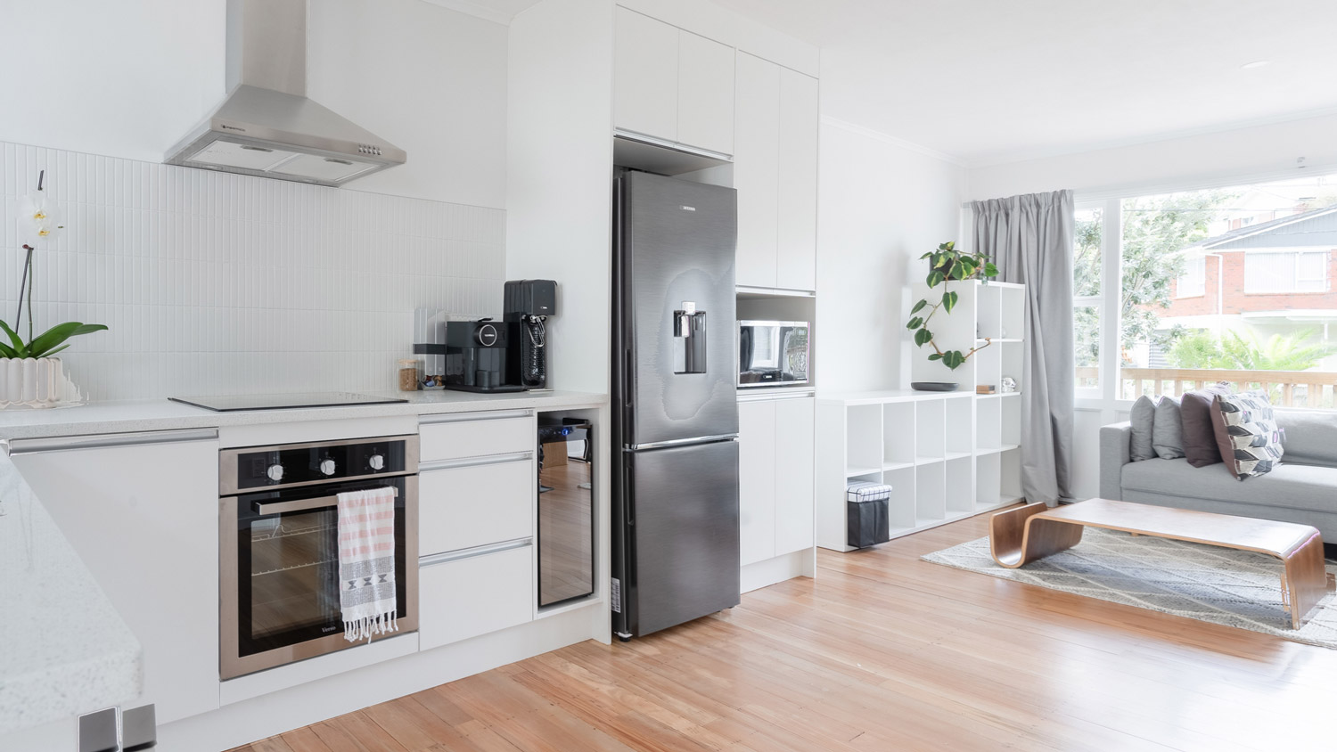 An open-space kitchen with the living room