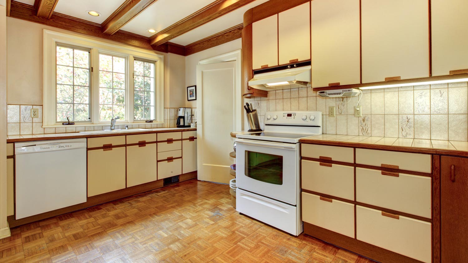 The interior of an outdated kitchen