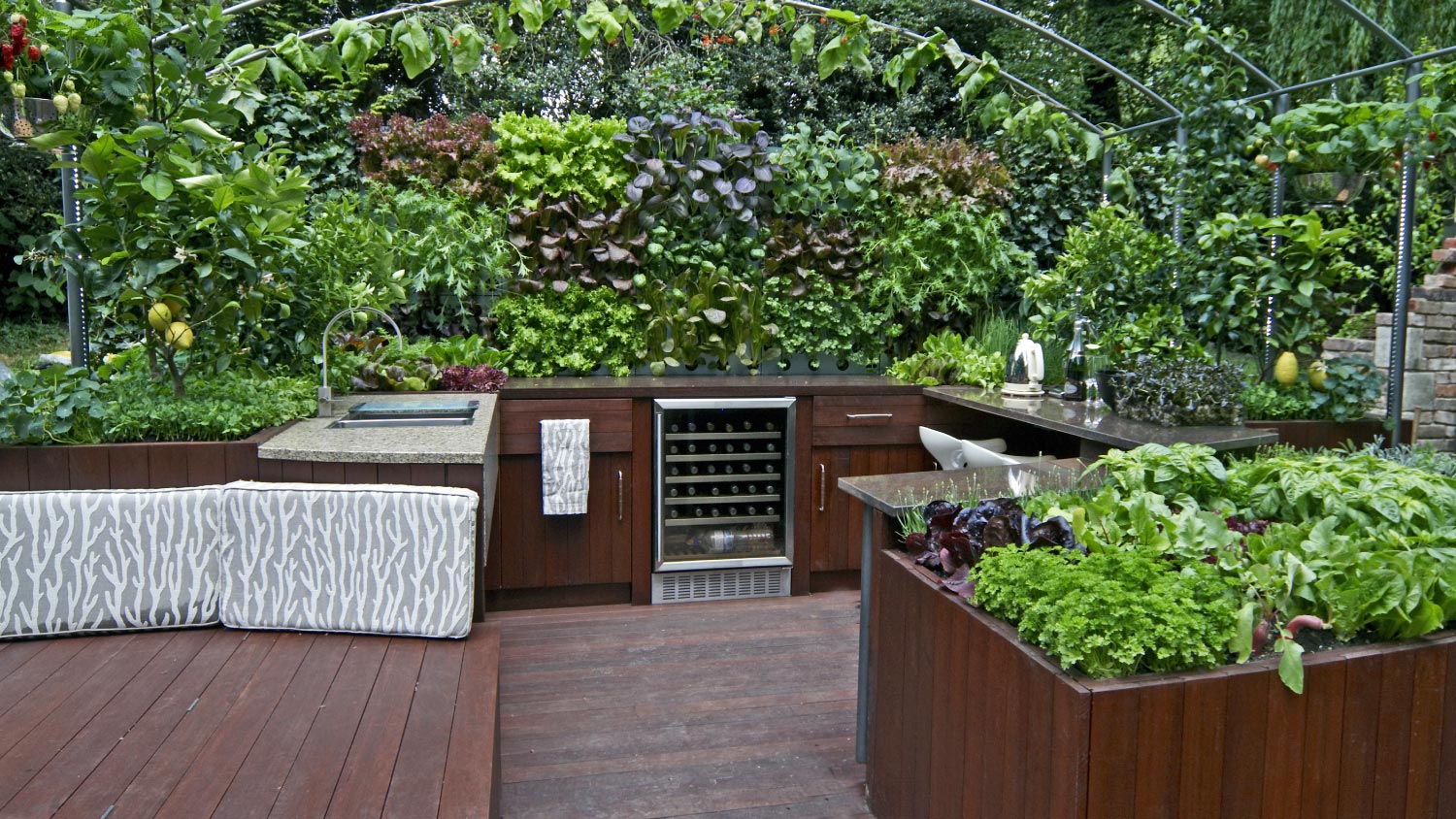 An outdoor kitchen with a ready supply of fresh herbs