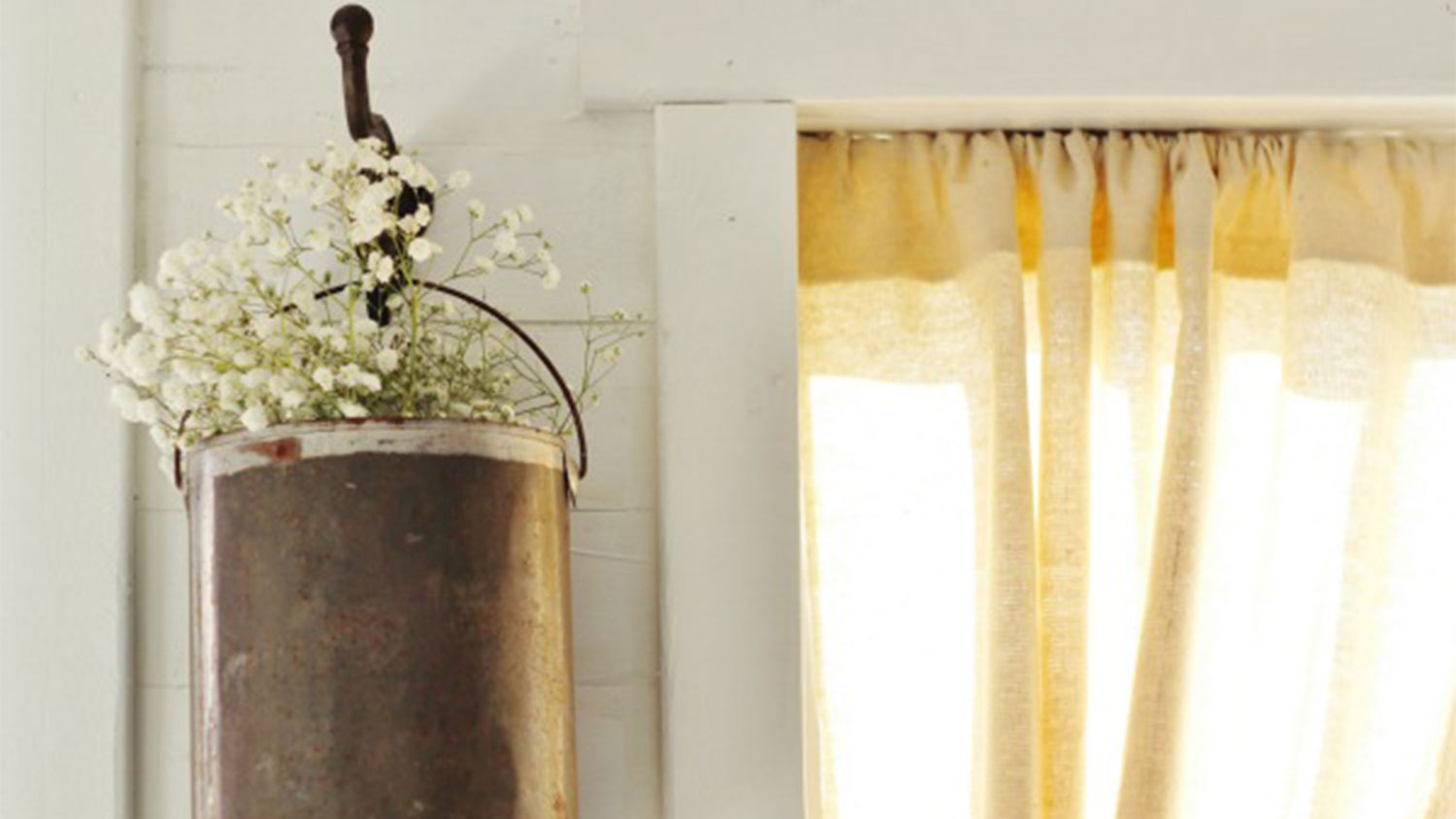 Paint can being used as flower holder