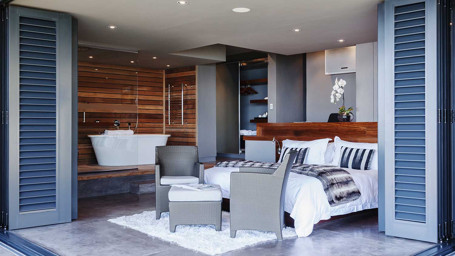 Modern bedroom with patio doors open