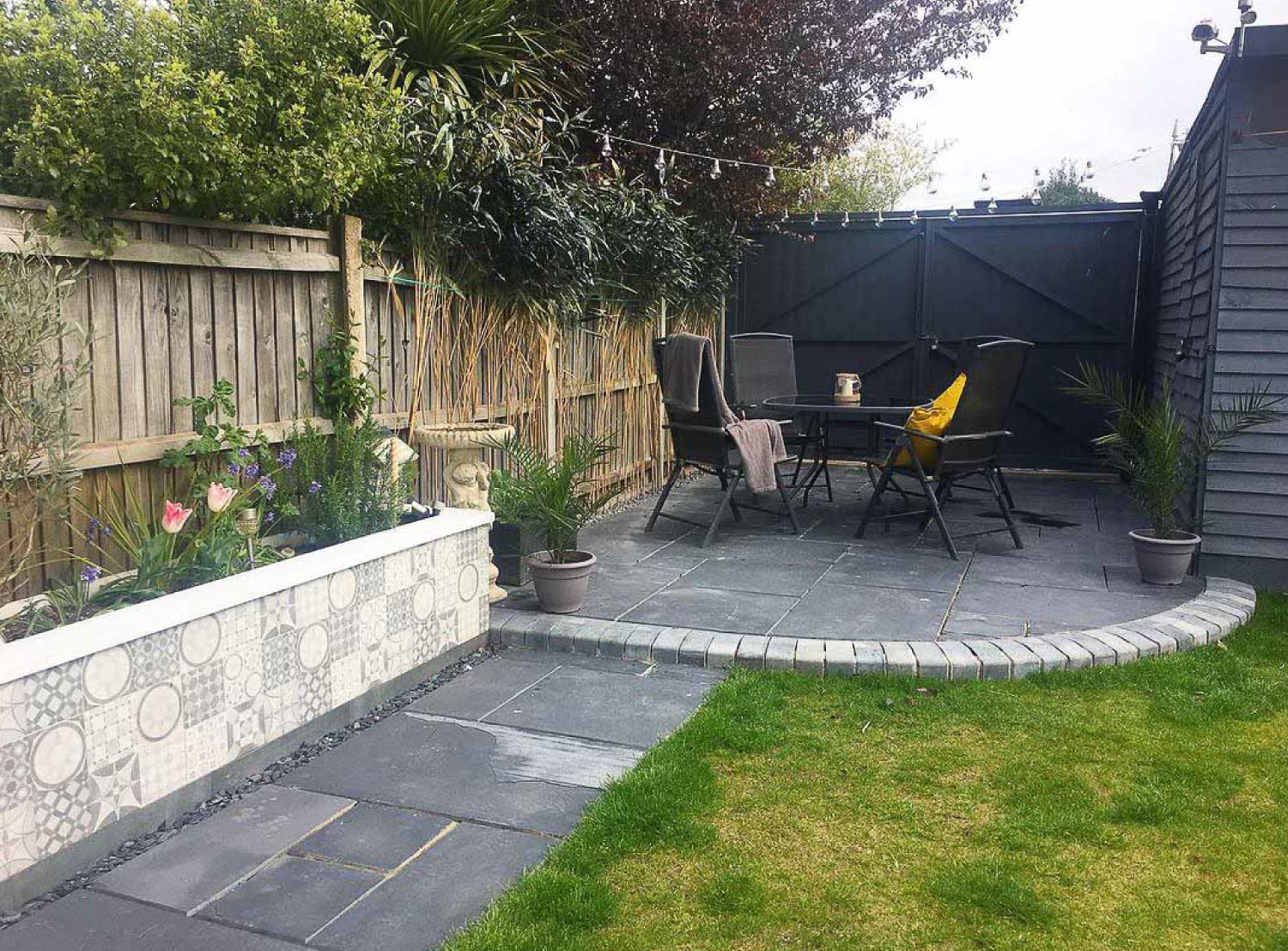 A limestone paver patio and outdoor furniture