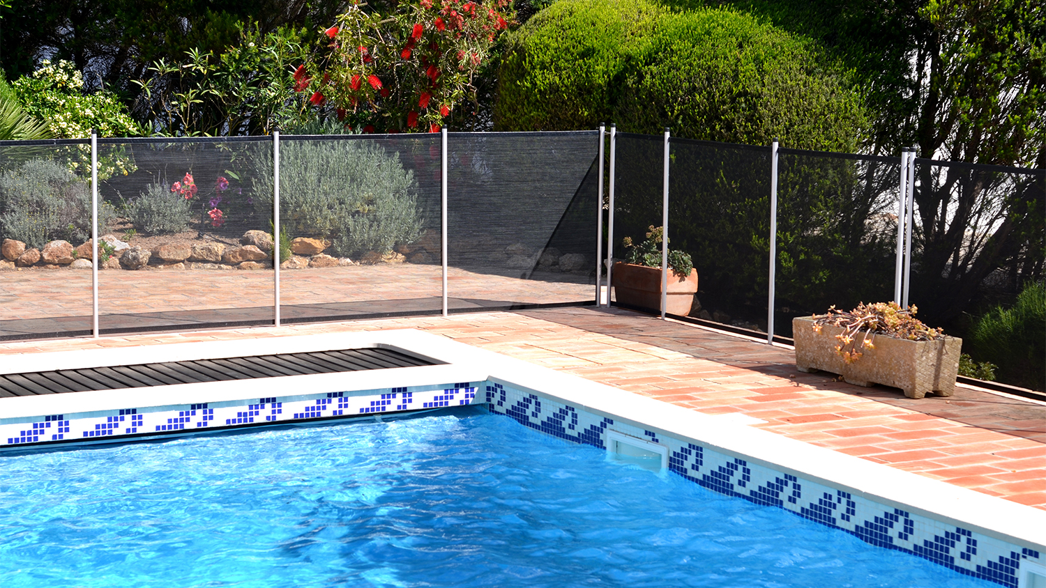 swimming pool with safety fence