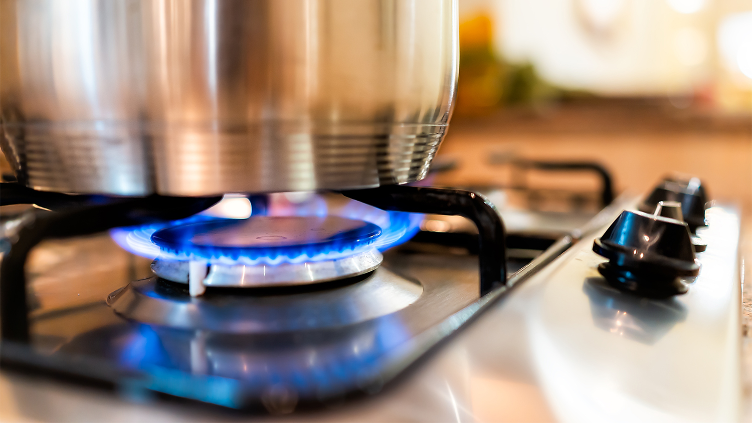 pot on stove with flame