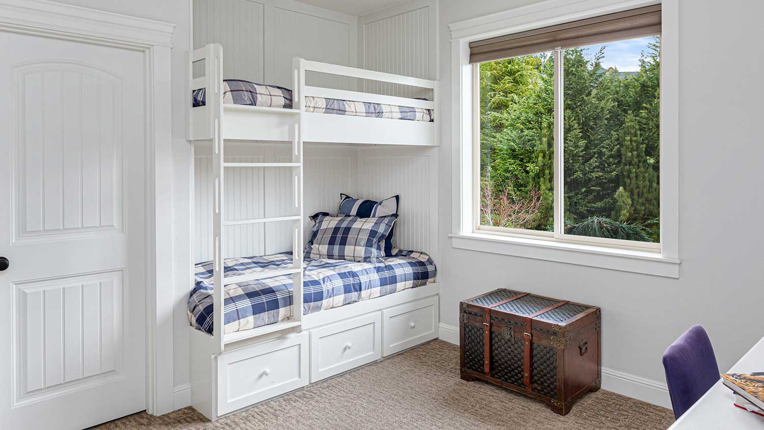 Bright kid’s room with bunk beds