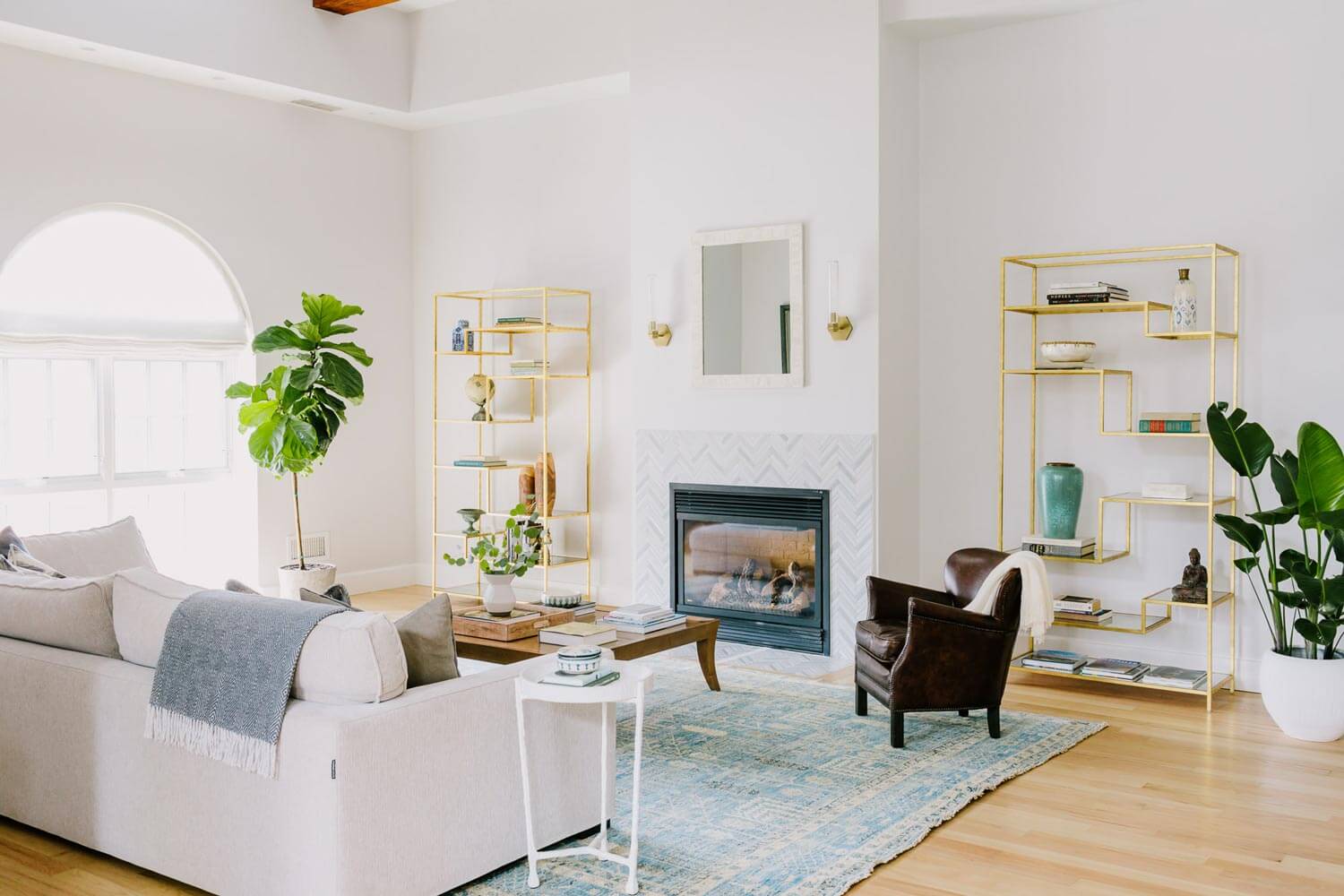 A serene living room with metallic shelves