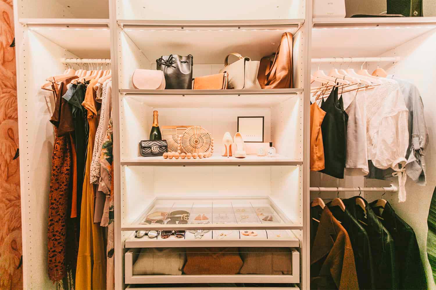 Shelves of a closet with a line of bulbs