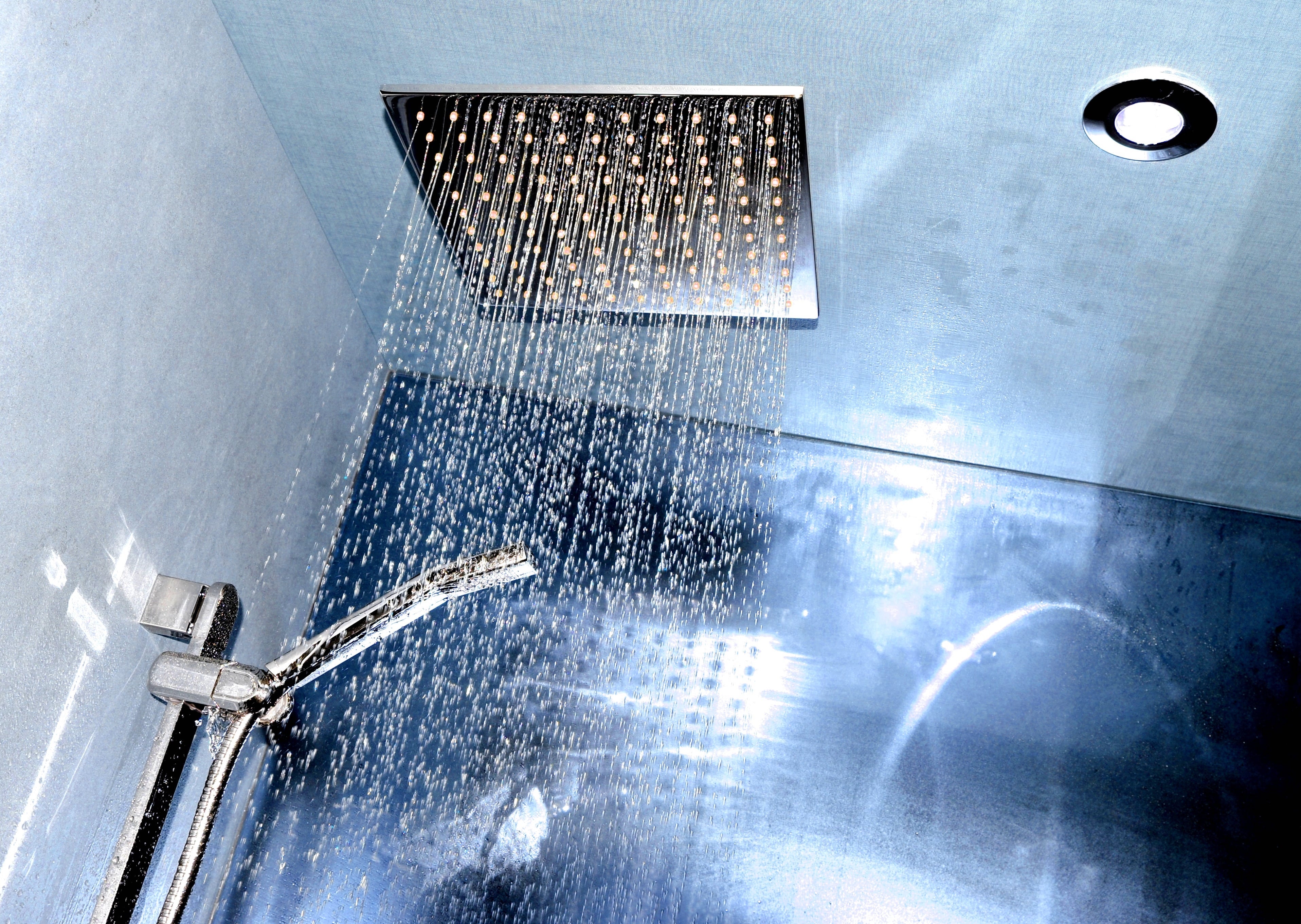 Modern shower head in ceiling