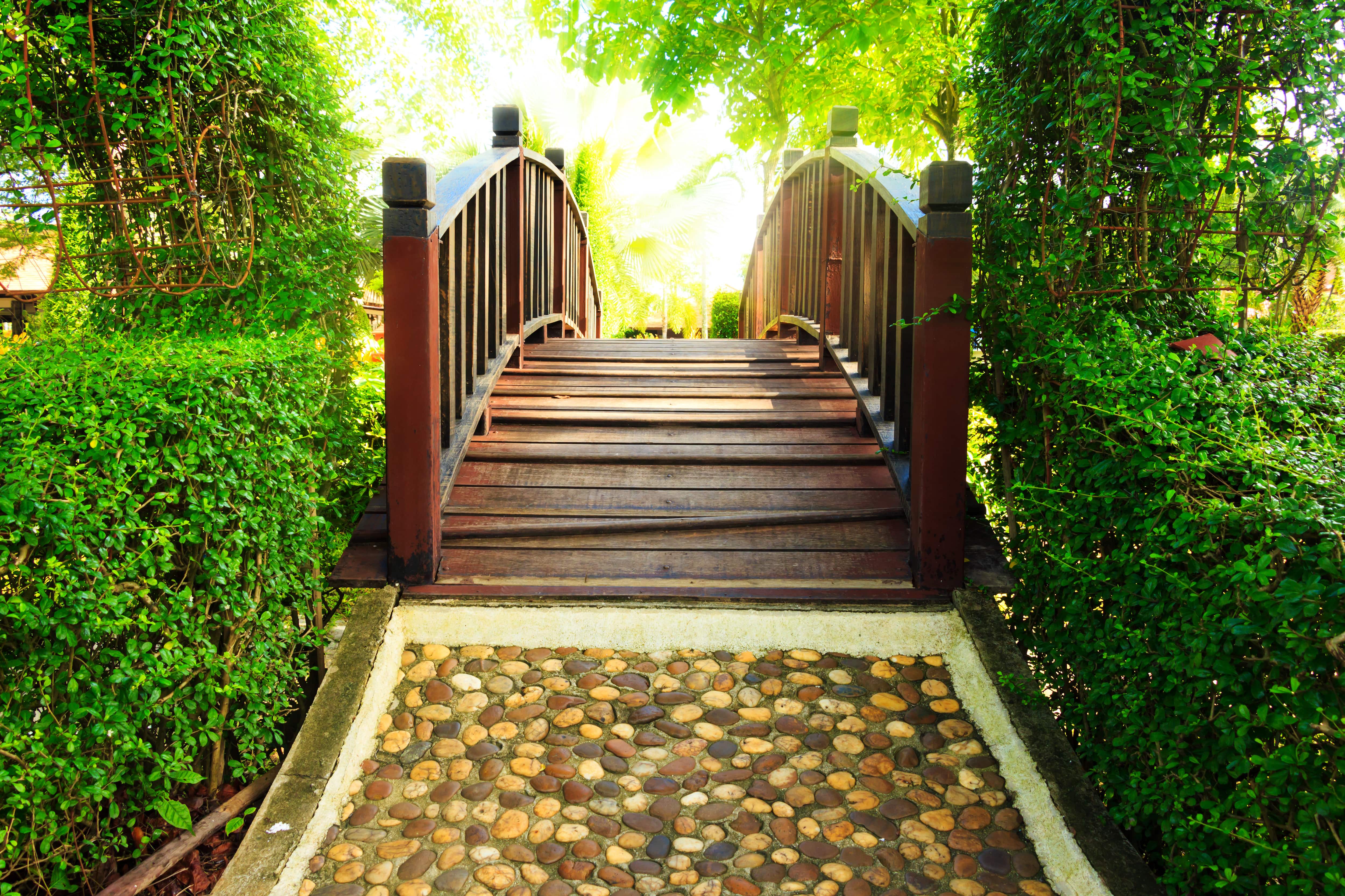 A stone path leading up to a bridge