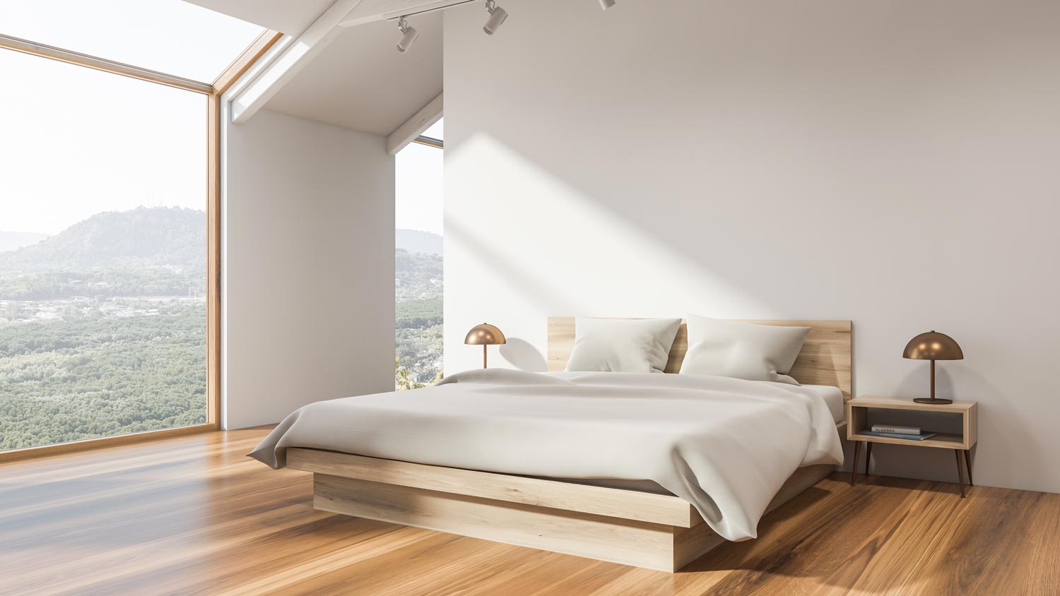 A stylish white attic bedroom