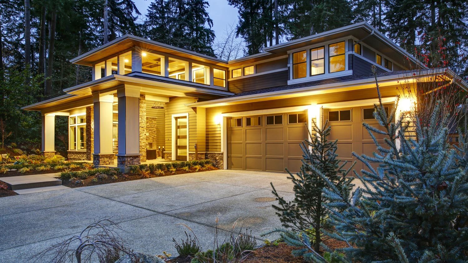 A taupe colored house at dusk