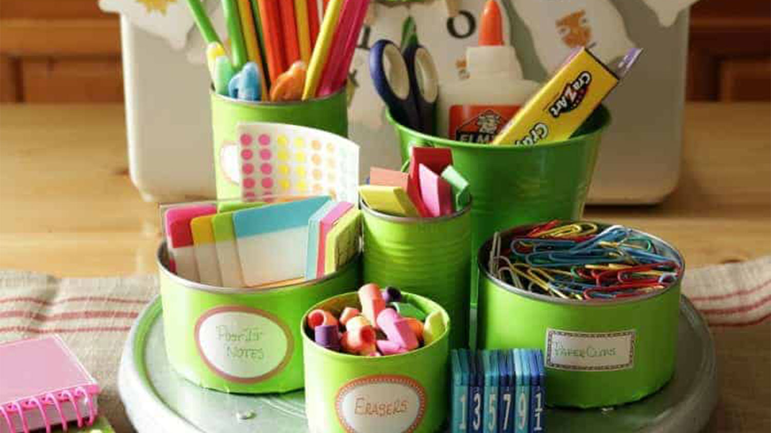 Tin cans being used as desk organizers