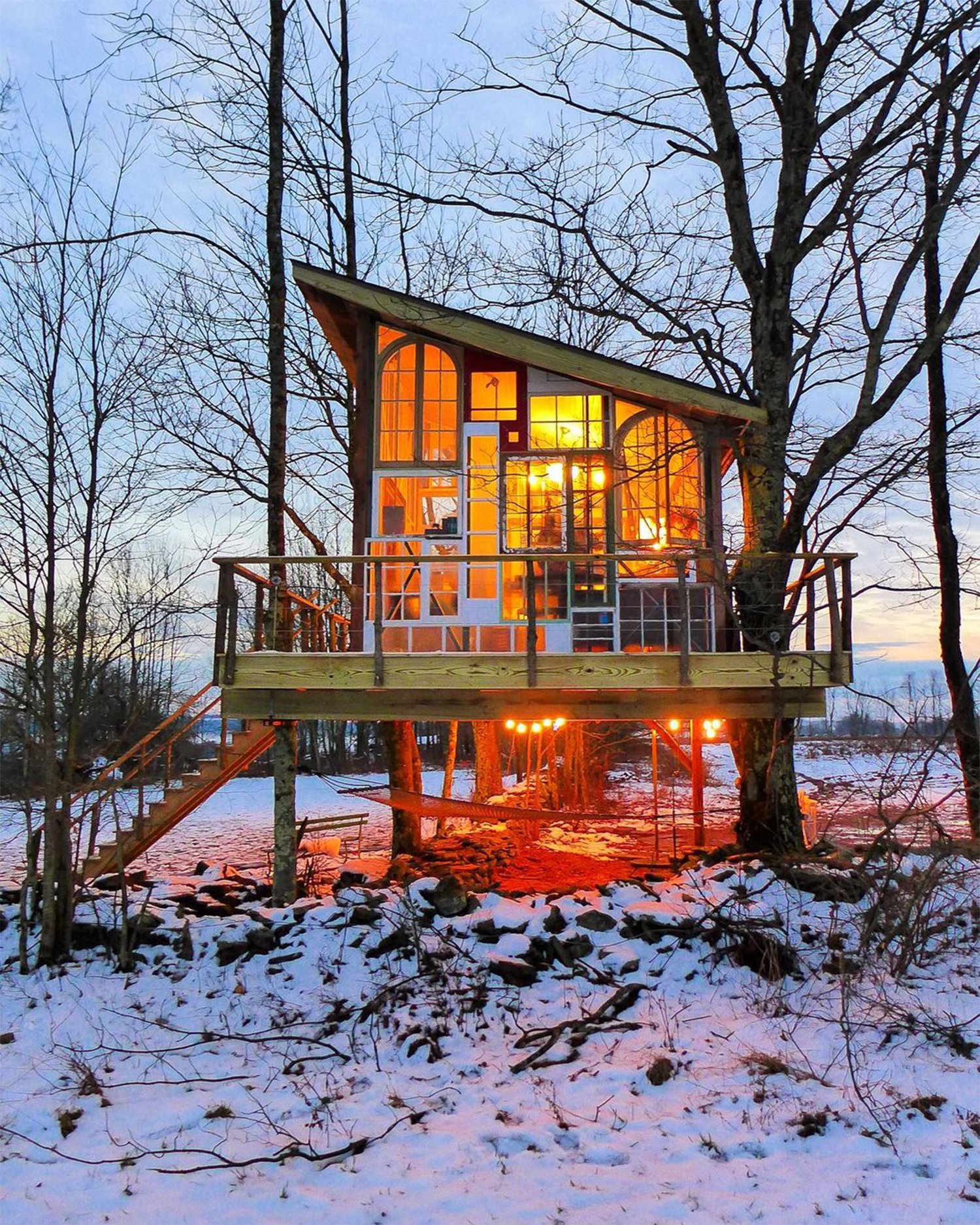 Dreamy treehouse with repurposed windows