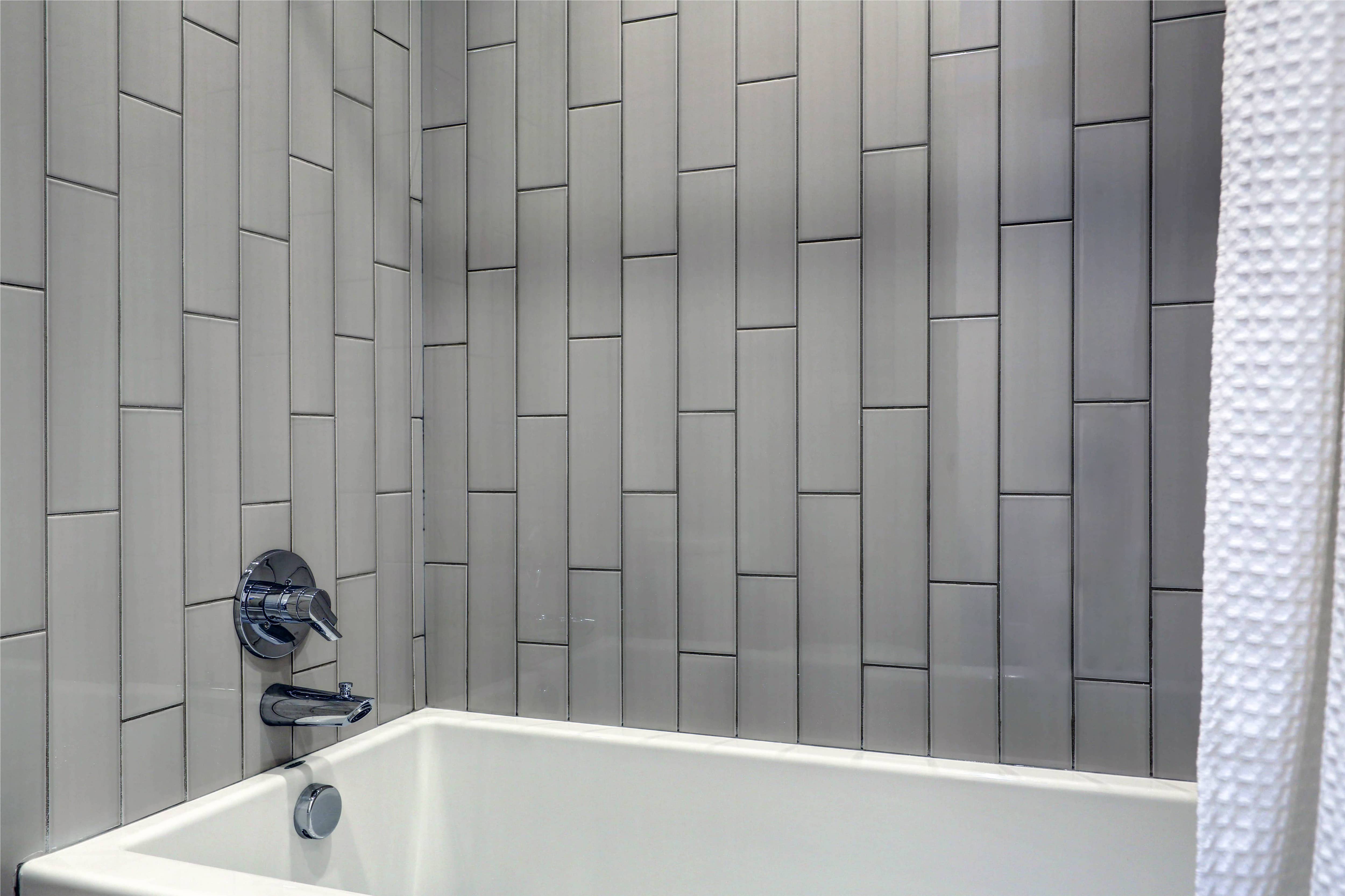 Modern gray vertical subway tiles