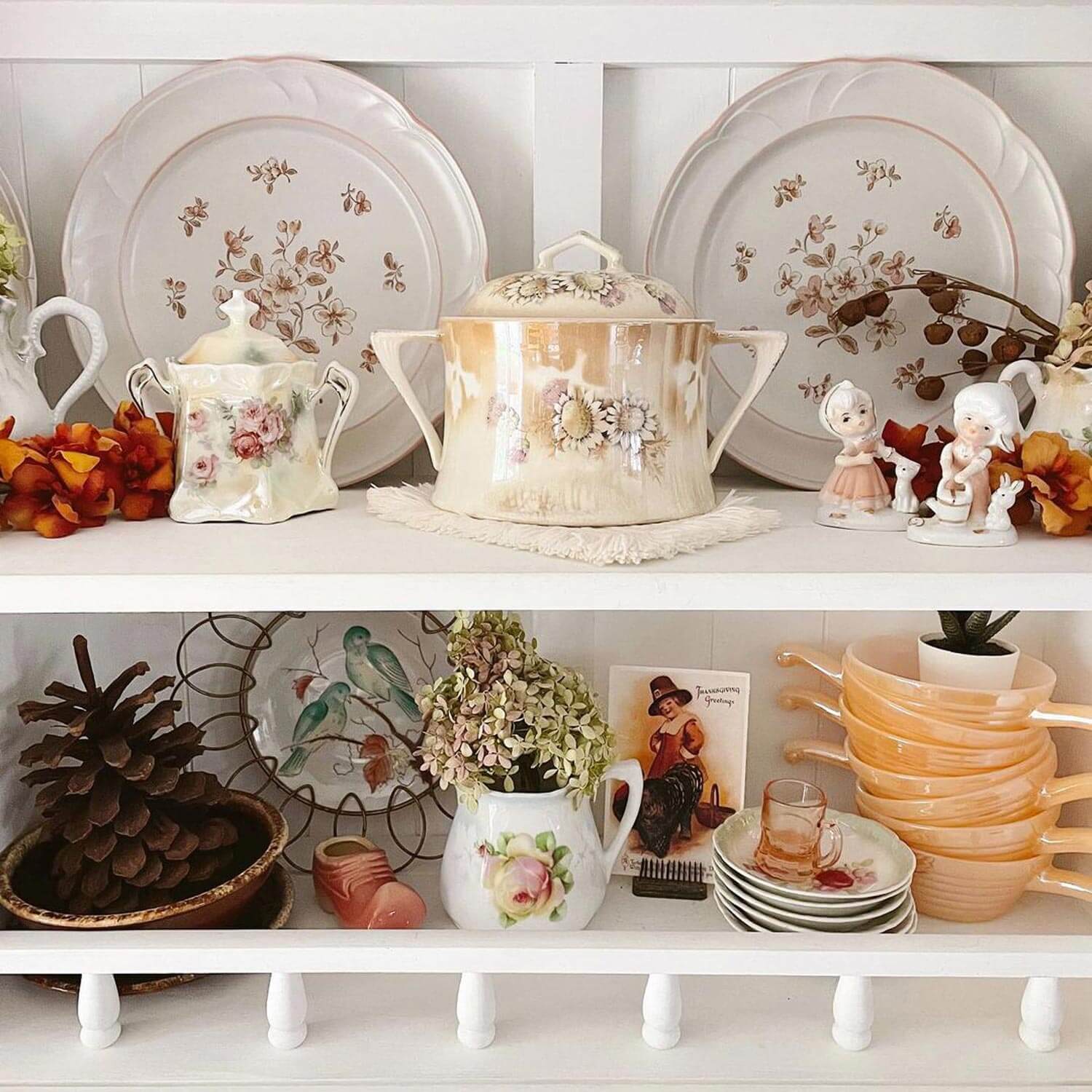 A vintage plate display in a cottage