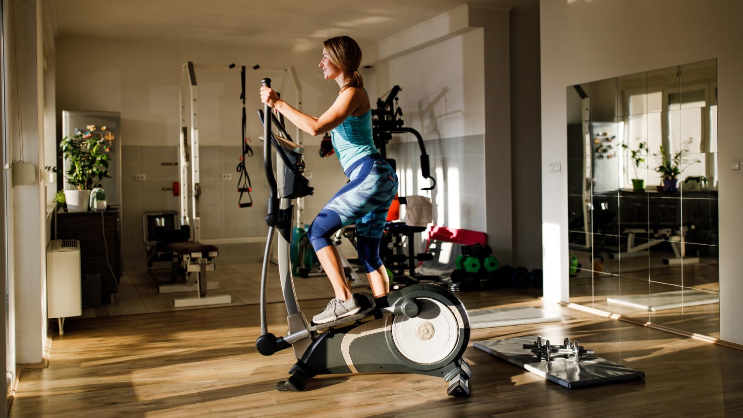 A woman cycling on exercise bike