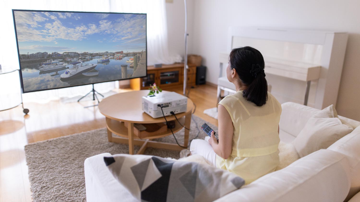 woman using tv projector