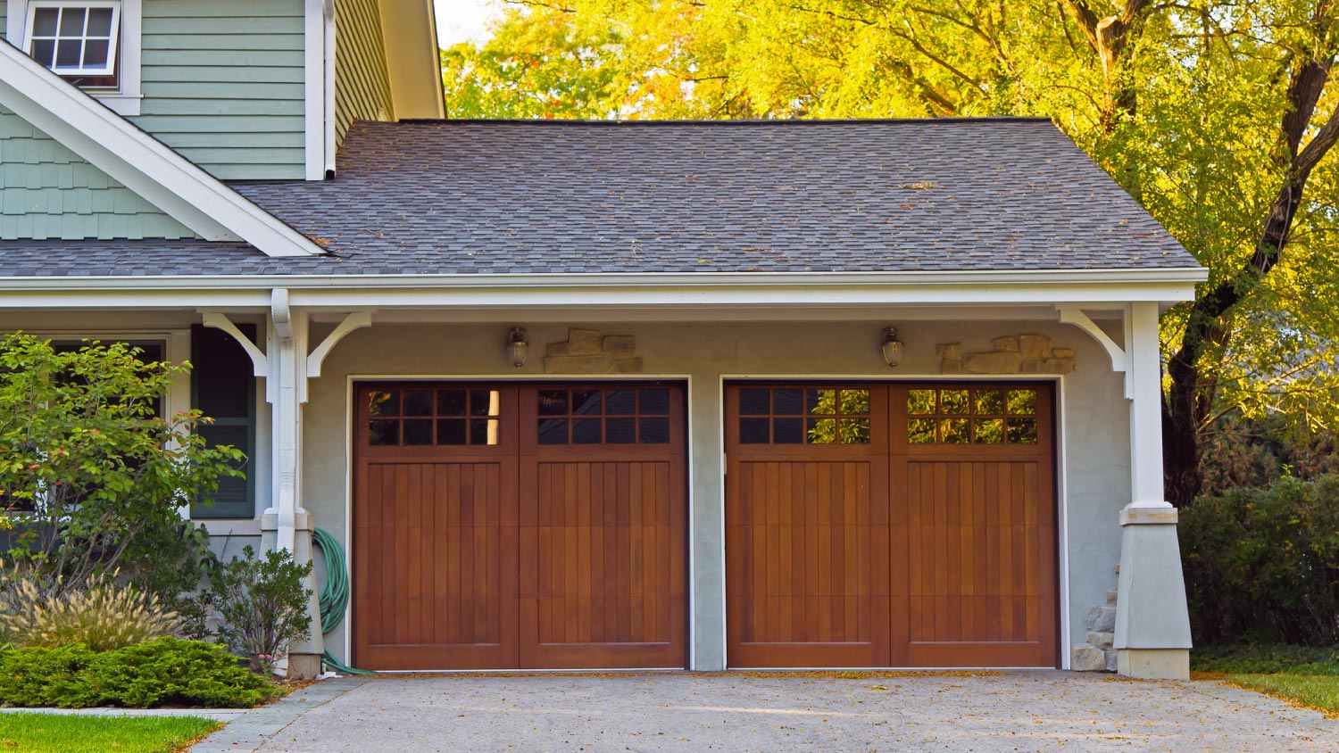 Two wooden car garage